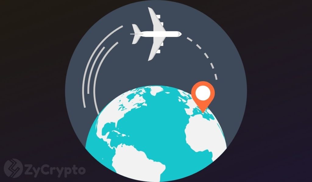  crypto booking discount users partnership travel app 